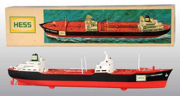 Scarce Hess Voyager Oil Ship Toy.: American. Hess Voyager decals on front and rear. Some chipping and pealing to decals. Includes original box with some staining and one small insert. Box: 17" L. (Very Good - Excellent).