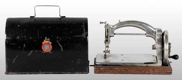 Ideal Silver Sewing Machine.: With metal cover. Working. 9" x 6". (Excellent).