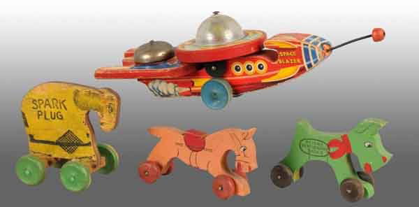 Lot of 4: Wooden Pull Toys.: Includes no. 750 Fisher Price Space Blazer, two advertising shoe store dogs, and one Spark Plug. Largest: 5" T. (Very Good).