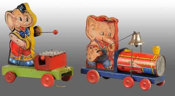 Lot of 2: Fisher Price Elephant Pull Toys.: Includes one Jumbo Xylophone and one Tiny Ding-Dong. Both are all original and complete with some oxidation to bare metal parts. Largest: 10 - 1/2" T. (Very Good).
