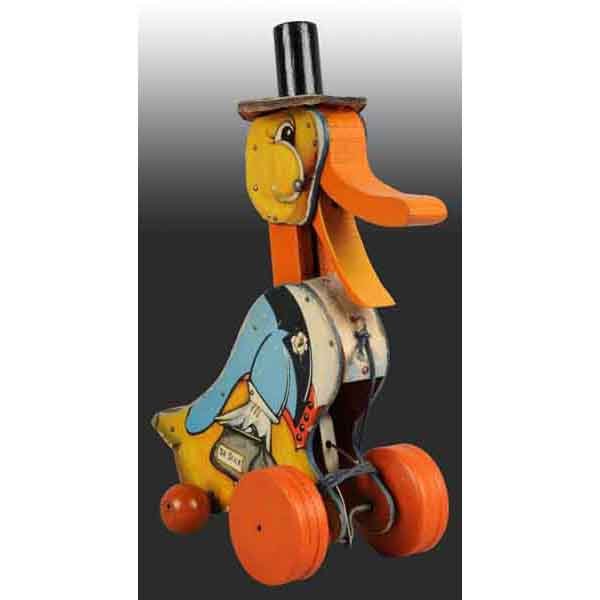 Fisher Price No. 100 Dr. Doodle Toy.: American. 1932. Original hat and pull string. Bellows is not working. 11" T. (Very Good).