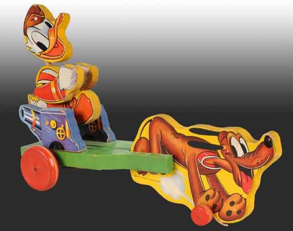 Fisher Price No. 744 Disney Doughboy Donald Duck.: American. 1942. All original. 14" L. (Excellent).