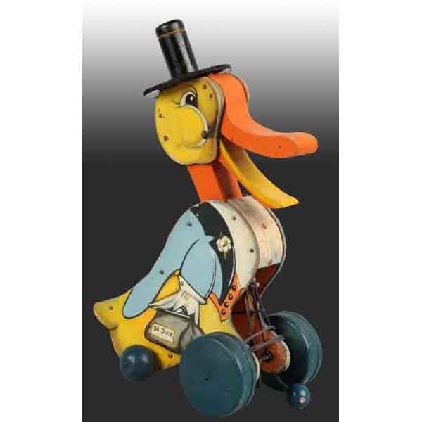 Fisher Price No. 100 Dr. Doodle Toy.: American. 1932. Original pull string and replaced hat. Bellows is not working. 11" L. (Very Good).