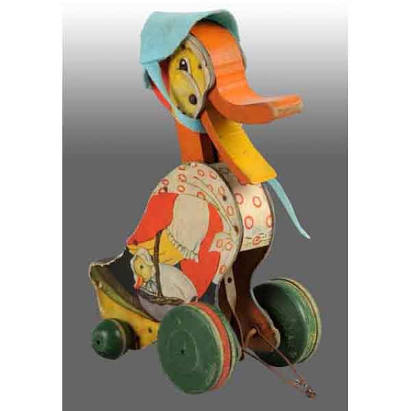 Fisher Price No. 101 Granny Doodle Toy.: American. 1932. Original pull string and replacement hat. Bellows is not working. 10" T. (Very Good).