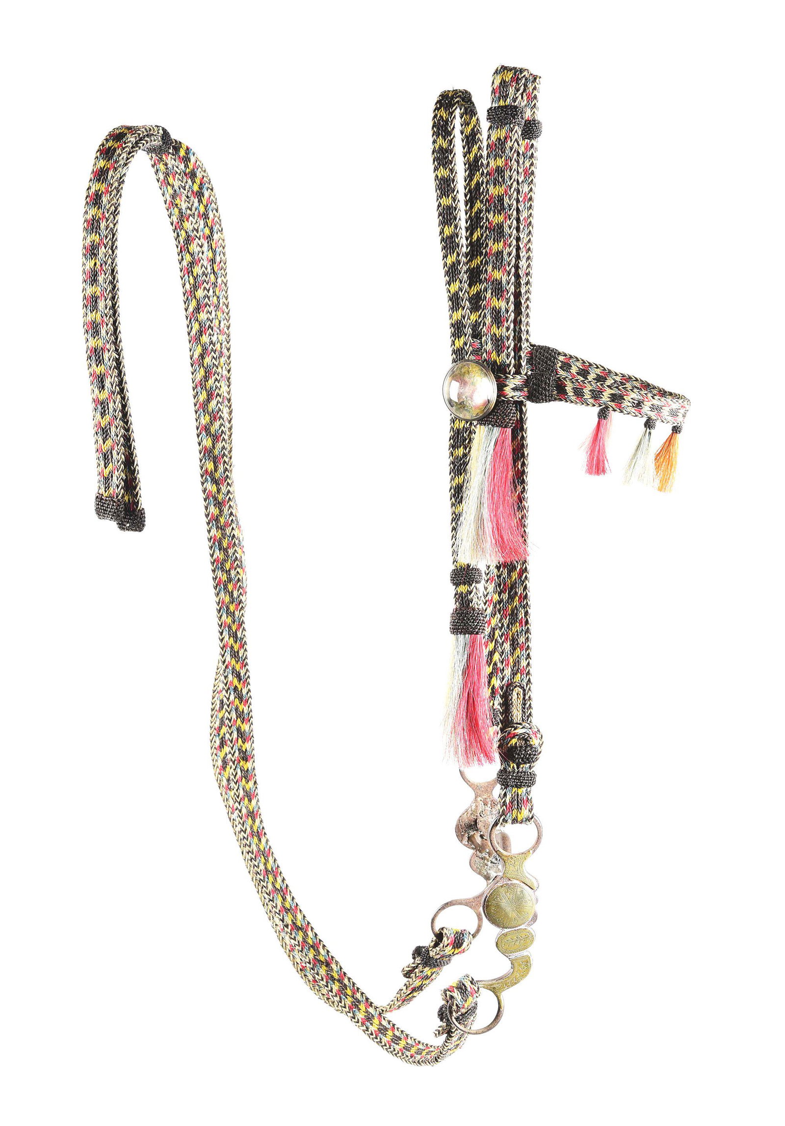 CANYON CITY PRISON HORSE HAIR BRIDLE.: Very interesting horse hair bridal and rains. It has 6 different colors in it as black, white, yellow, blue, red and orange. It is bradded flat instead of round. Glass rosettes have a flower motif in 