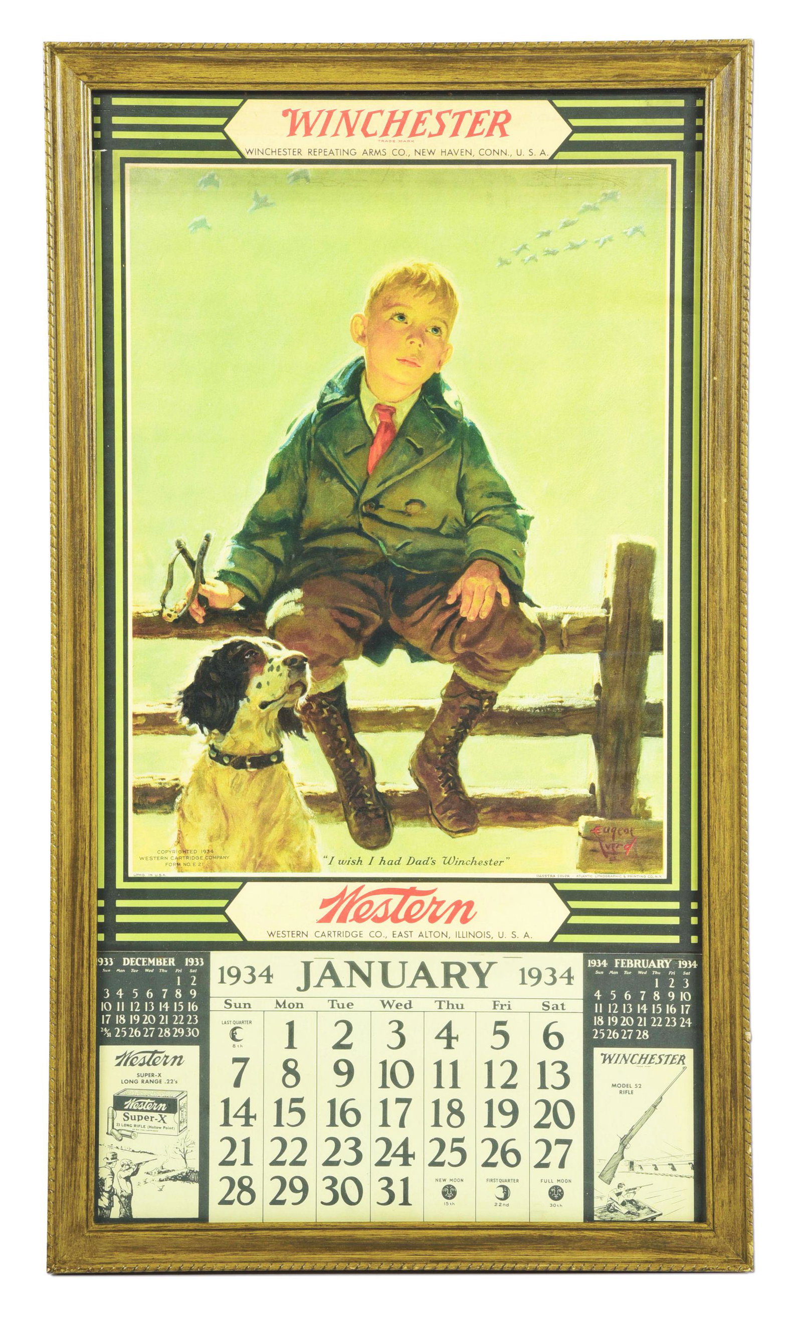 FRAMED 1934 WESTERN ADVERTISING CALENDAR.: The image on the 1934 Winchester / Western calendar was painted by Eugene Iverd (1893-1938). It measures 14 - 7/8" x 27 - 7/8". It depicts a boy with a slingshot sitting on a fence with his dog, wishi