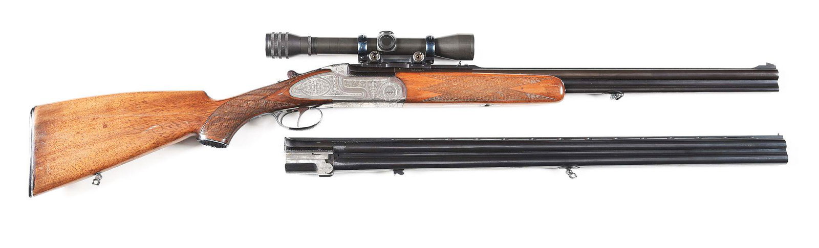 (C) ANTONIO ZOLI 2 BARREL SET COMBINATION GUN AND OVER: Antonio Zoli 2 barrel set combination gun made in Italy by Zoli and marketed by Schuab in Hall, Germany. Gun has blued shotgun-over-rifle barrels with matted rib and ramped front sight with rail mount