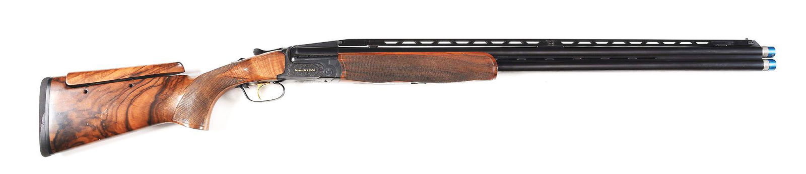 (M) PERAZZI MX2000 OVER UNDER SHOTGUN WITH CASE.: Circa 2010. A 12 gauge with monobloc 31 - 1/2" blued barrels, 3" chambers and Multi chokes. Barrels have an adjustable raised ventilated cross file cut matte top rib with small steel mid bead and whit