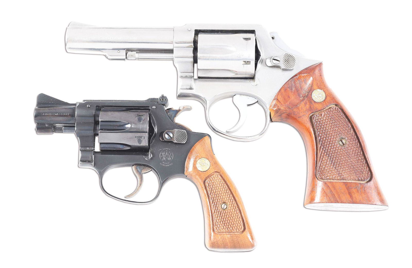 (M) LOT OF 2: SMITH & WESSON MODEL 65-1 AND MODEL 34-1: Lot consists of (A) Stainless Smith & Wesson 65-1 K frame double action revolver manufactured in 1977 and chambered in the potent .357 Magnum cartridge. It features a pinned 4" heavy barrel, matte rib