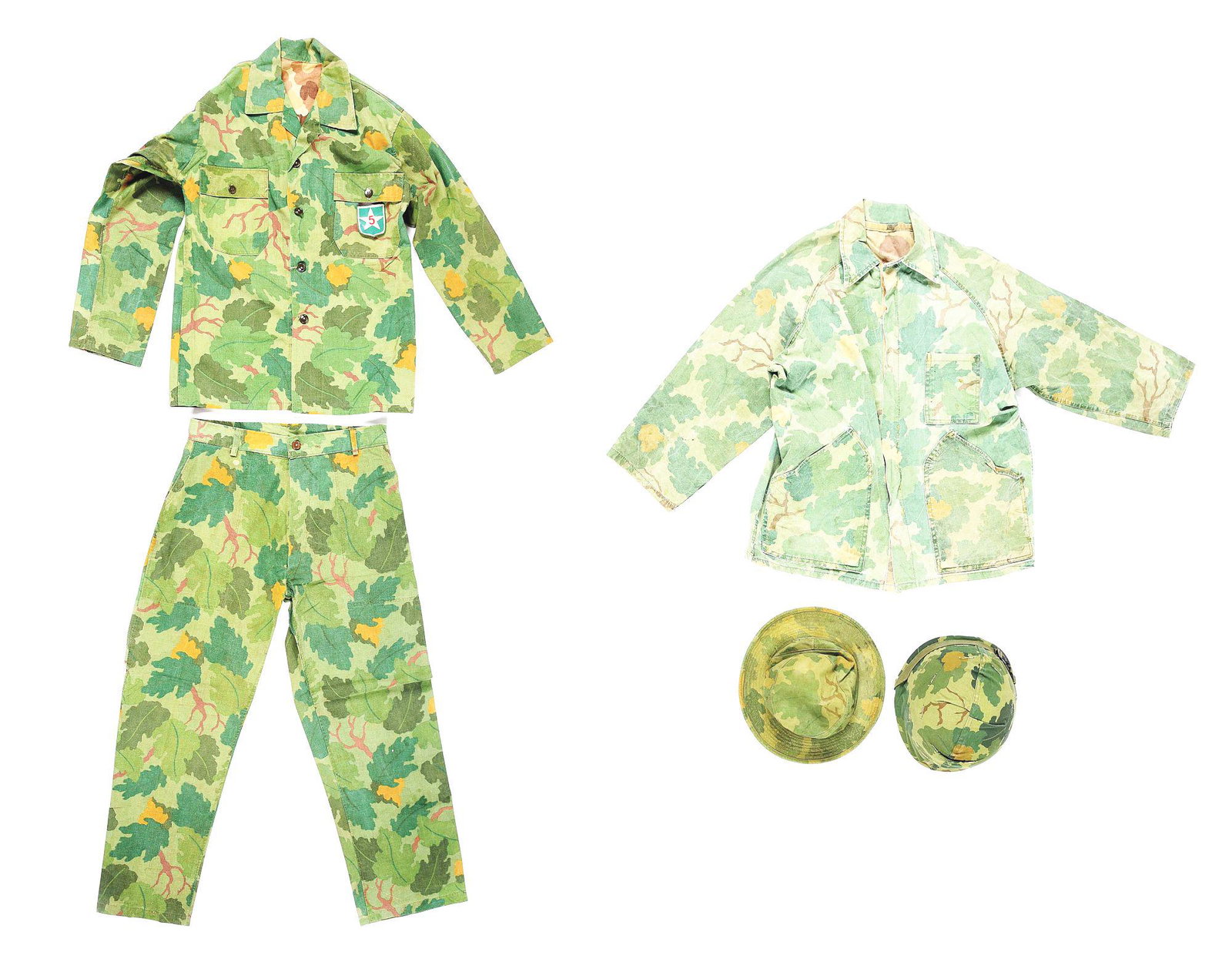 LOT OF EARLY VIETNAM WAR MITCHELL PATTERN JACKETS,: Lot consists of (A) Vietnam War reversible Mitchell camouflage jungle uniform. These uniforms were issued and tested on Okinawa and were also theatre made out of half shelters in Vietnam. They were al