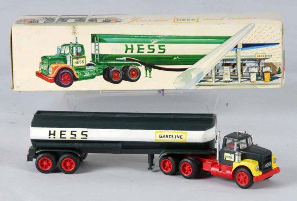 Plastic Hess Gasoline Truck Toy.: American. Manufactured by Marx. One of the first in this series of gasoline trucks. Some chipping to the decals. Includes original box with some spotting. 16" L.
