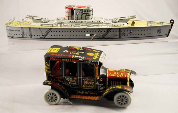Lot of 2: Marx Tin Wind-Up Vehicle Toys.: Includes Marx Old Jalopy automobile and USS Washington battleship. Both working. Boat is missing small wooden depth charges, otherwise both have very little wear. Largest: 15" L.