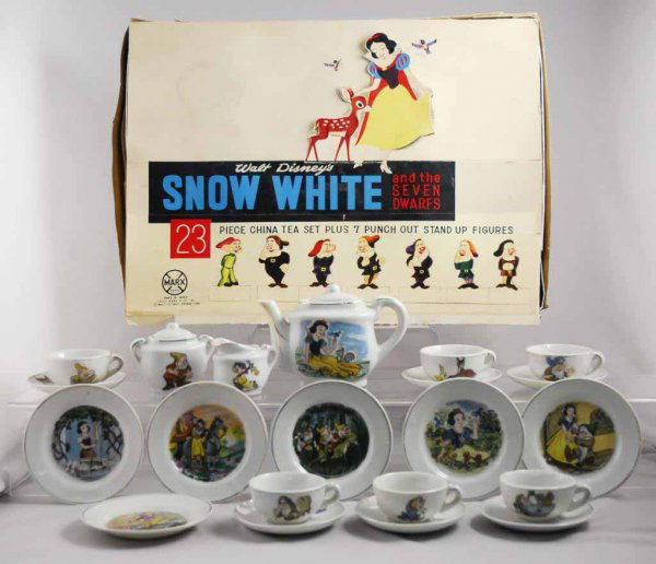Marx Walt Disney Snow White Tea Set.: Circa 1950s. Made in Japan. Marked "Made in Japan" on the bottom. Includes original box and inserts. Still has Snow White and Seven Dwarf cardboard punch out stand-up figures on lid. Includes pitcher