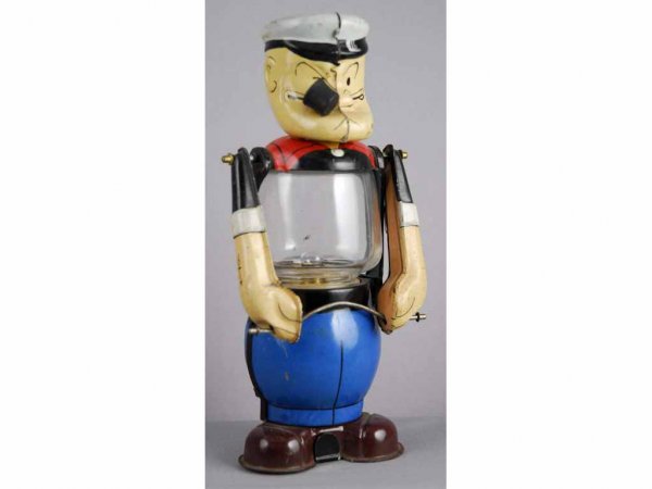 Linemar Popeye Lantern Toy.: Original pipe. Rust in battery box and not working. Some scratching and wear. 7" T.