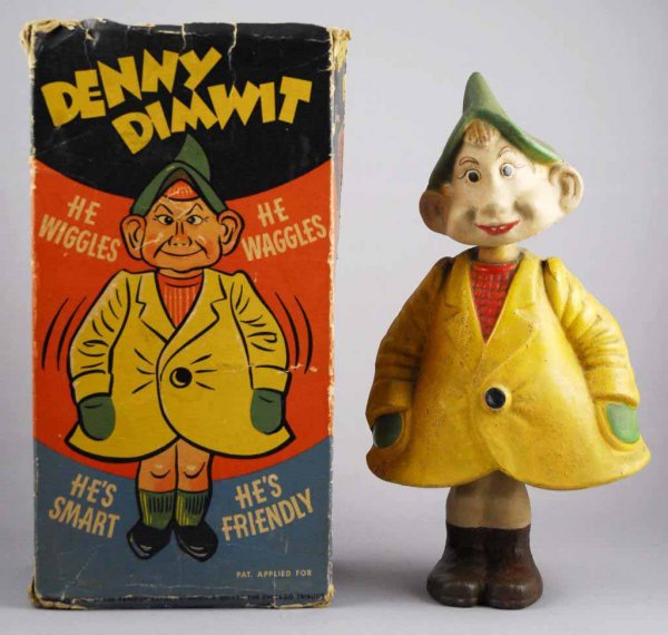 Composition Denny Dimwit Doll.: Circa 1940s. Made by Toy Craft Incorporated USA. Famous artist syndicate Chicago comic strip character includes original colorful box missing top flaps. Box has some creasing and tears. Doll wiggles b
