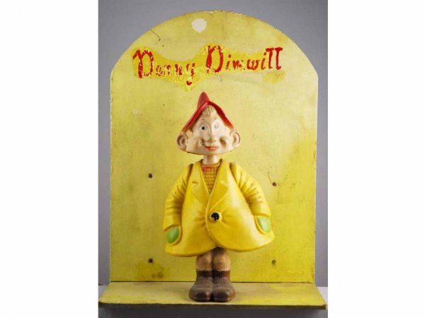Unusual Denny Dimwit Toy Electric Store Display.: Circa 1940s. Comic strip toy made by Toy Craft Incorporated. Electric, when plugged in Denny is supposed to dance back and forth but he does not dance. Some cracking to face. Overall display is dirty 