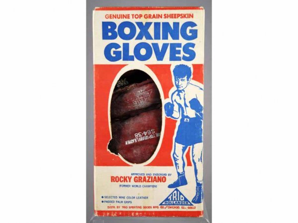 Rocky Graziano Sheepskin Boxing Gloves.: Circa 1950s. Made by Trio Sporting Goods. Gloves are made for youth 12 - 15 years old. Original $5.99 price tag is on top of box. Gloves have some age wear and mildew. Unused condition. Box 12" T.