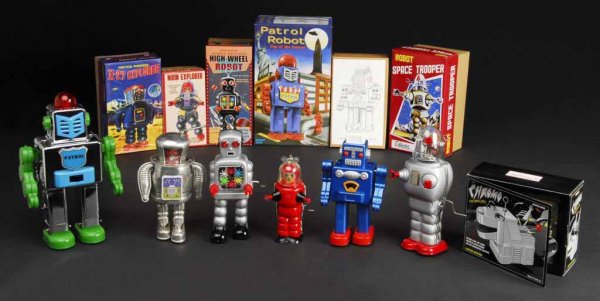 Lot of 7: Tin Contemporary Robot & Space Toys.: Japanese. Includes seven original boxes. Largest: 12" T.