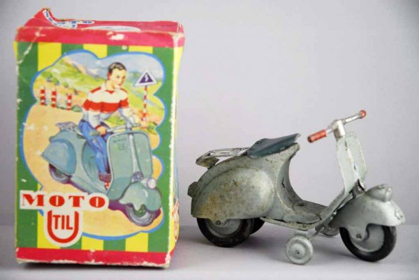 Moto Til Scooter Toy.: Italian. Includes original box. Working. Some pitting and rust throughout cycle. 6" L.