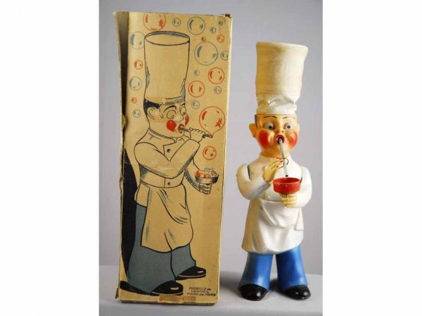 Pre-War Composition Bubble Bowling Chef Toy.: France. Includes original box, missing two inner flaps, outer flap detached but present. Box has split on one seam. Toy has very little wear. Composition toy with moveable arms. Marked "Made in France