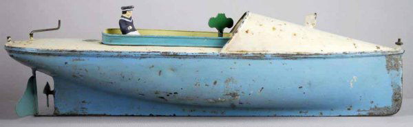 German Tin Wind-Up Bing Speed Boat.: Includes bisque sailor, which appears original but not to boat. Boat has moderate overall scratching and wear and has been restored. 15" L.