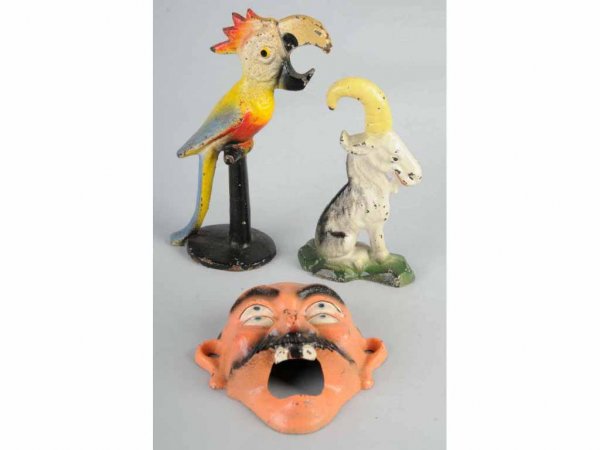 Lot of 3: Cast Iron Bottle Openers.: Made by John Wright. Includes one goat, one parrot on perch, and one double-eye wall mount. Largest: 5 - 1/2" T.