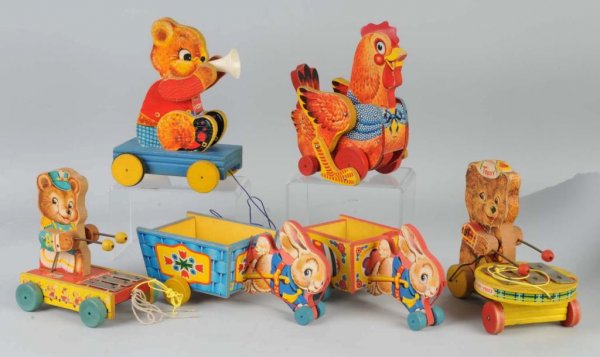 Lot of 6: Paper on Wood Fisher Price Animal Toys.: Includes two Teddy Xylophones, one Teddy Tooter, two rabbit pull carts, and one Big Red Hen. Moderate overall wear. Largest: 7" x 10 - 1/2".