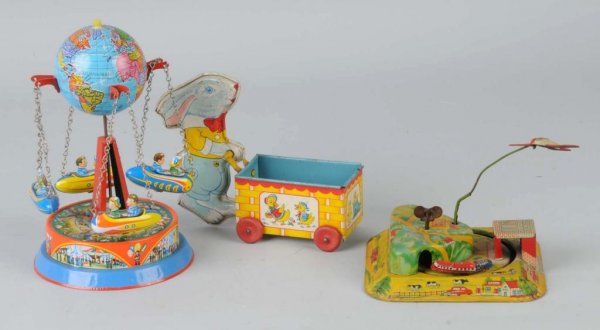 Lot of 3: Tin Miscellaneous Toys.: Includes Chein rabbit pushing cart, Japanese Honeymoon Express, and tin Globe Ride toy marked "Western Germany'. Largest: 8" T.