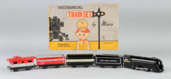 Tin Marx Freight Train Toy Set.: American. New York Central Mercury engine with New York Central tender, one Pennsylvania boxcar, and one New York Central caboose. Some scratching and wear. Includes original box with one end missing.