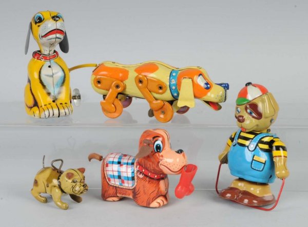 Lot of 5: Tin Dog Wind-Up Toys.: Japanese. Working. Includes TPS Pat the Pup, skipping rope dog, and three others. Largest: 8 - 1/2" L.