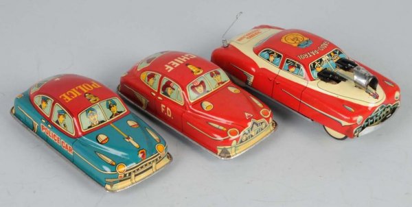 Lot of 3: Tin Automobile Friction Toys.: Japanese. Working. Two police cars and one fire car. Nice colorful lithography. Largest: 6 - 3/4" L.