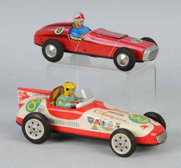 Lot of 2: Tin Race Car Friction Toys.: Japanese. Working. Includes one marked number "8" and the other number "9". Nice lithography. Largest: 8" L.