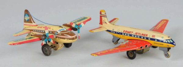 Lot of 2: Tin Airplane Friction Toys.: Japanese. Working. Includes one Douglas and one Comet Jet Liner. Largest: 8 - 1/2" x 10 - 1/2".