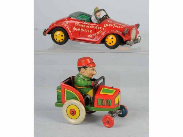 Lot of 2: Tin Vehicle Toys.: Japanese. Working. Includes one friction Roadster with celluloid driver and one wind-up Whoopee Car with tin driver. Largest: 4 - 3/4" L.