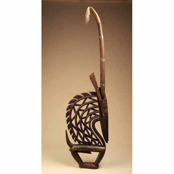 West African Chiwara (Antelope) Figure.: From Mali. Made of wood, brass, textile, leather, and horse hair. 72" T.