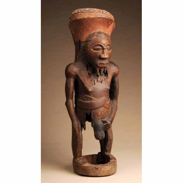 Central African Drum Figure.: From Zaire (Democratic Republic of Congo). Made of wood and metal. 33" T.