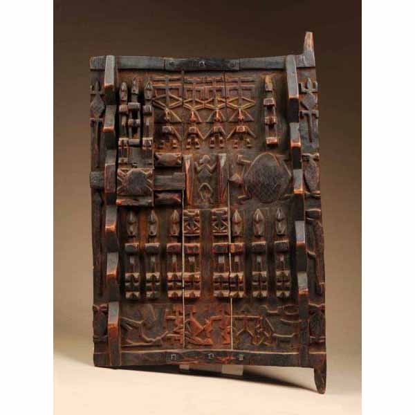 West African Dogon Granary Door.: From Mali. Made of heavy wood with wooden lock. Beautiful carving. 24" T.