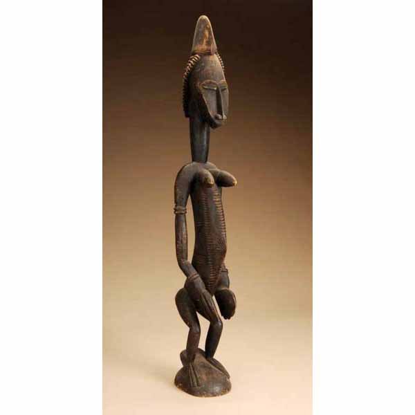 West African Bambara Figure.: From Mali. Made of light wood. 35" L.