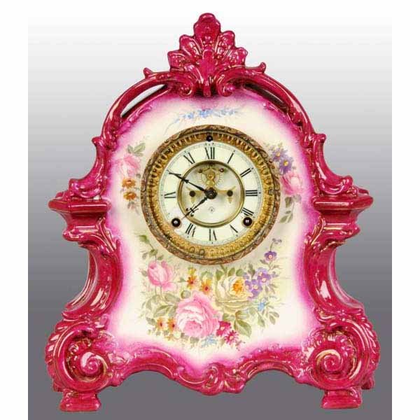 Time & Strike China Clock.: Marked " Bonn Germany" and "La Brelagne" but with Ansonia time and strike movement and pendulum. In wonderful condition. 15" T.
