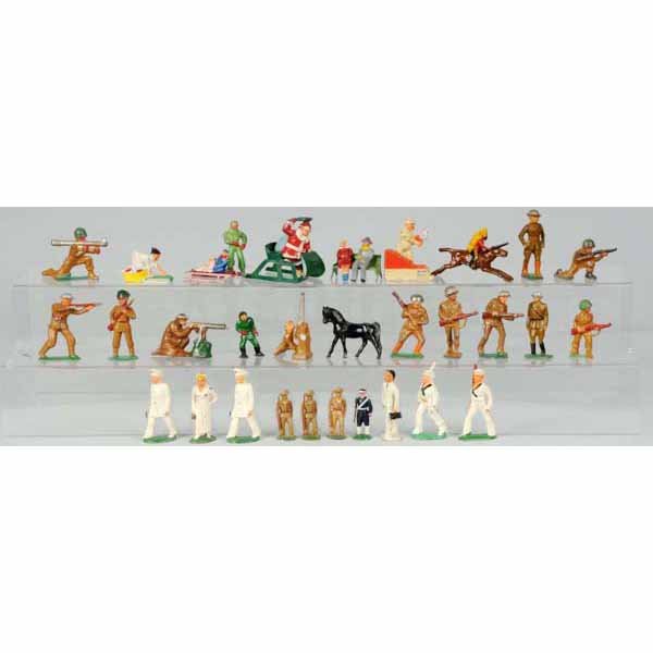 Lot of Dimestore Toy Soldiers.: 35 pieces total. Includes Barday Santa with holly spring on sleigh, boy pulling children on sled, soldier clubbing, standing, firing, and port arms, Manoil Doctors Advancing "Combat", Bazooka, Anti-Ai