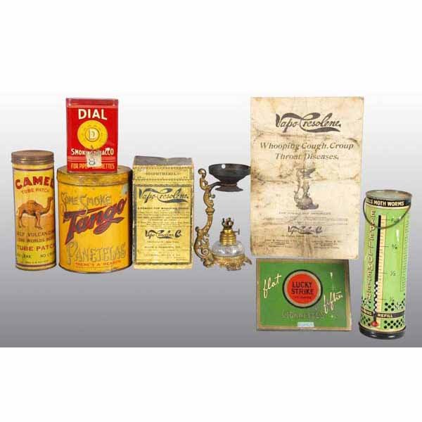 Lot of 6: Tobacco & Miscellaneous Tins.: Tins include Dial product tin with residual tape, Tango tin with scratches, Lucky Strike flat tin, Camel Auto Tube tin with stains, Vapo-Cresolene vaporizer with box and paper insert, and a moth tin. 