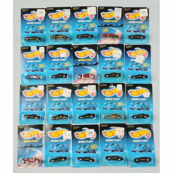 Lot of 20: Mattel Hot Wheels Speed Fleet Vehicles: Includes 1931 Doozies, 1980s Firebird, Chevy Stocker, Thunder Burner, Camaro Z-28, and others. Mint in packages, six bubbles with yellowing and creasing to cards.