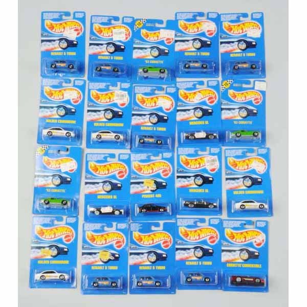 Lot of 20: Mattel Hot Wheels Blue Card Vehicles.: All in foreign packages with no numbers. Includes a few Renault 5 Turbos, one 1963 Corvette Convertible, and others. Mint on cards, some with slight bending and wear.