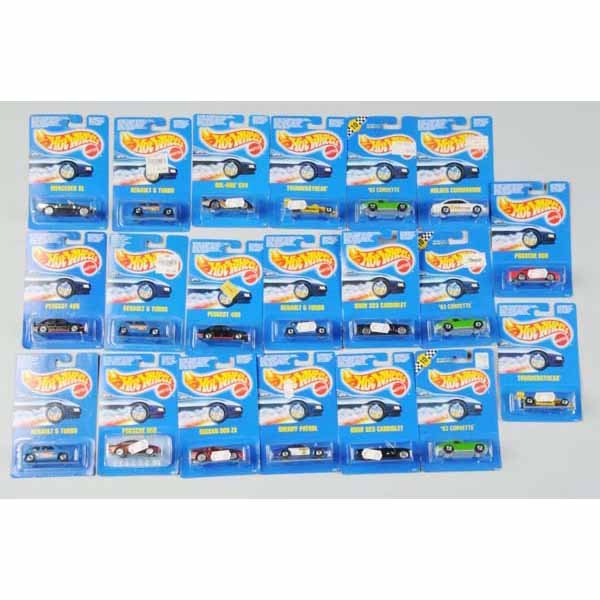 Lot of 20: Mattel Hot Wheels Blue Card Vehicles.: All in foreign packages with no numbers. Includes a few Renault 5 Turbos, one 1963 Corvette Convertible, and others. Mint on cards, some with slight bending and wear.