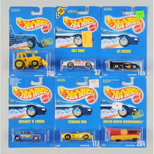 Lot of 50: Mattel Hot Wheels Blue Card Vehicles.: Includes no. 33 Camaro Z-28, no. 5 Good Humor Truck, no. 37 Hot Bird, and others. Mint on cards, some with slight wear throughout. Not all pictured.