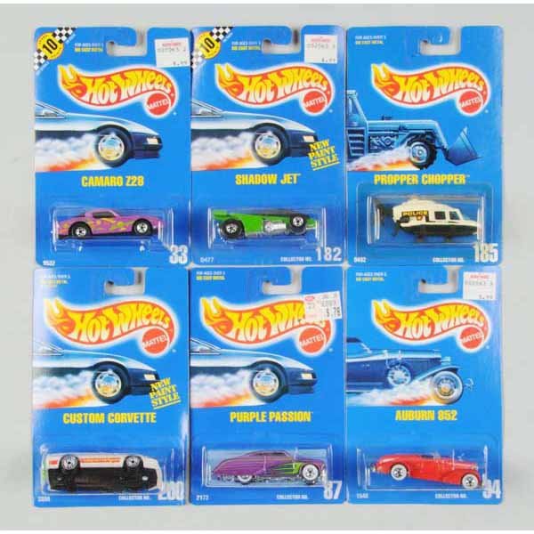 Lot of 50: Mattel Hot Wheels Blue Card Vehicles.: Includes no. 171 VW Bug, no. 200 Custom Corvette, no. 33 Camaro Z-28, no. 5 Good Humor Truck, no. 76 Kenworth Big Rig, and others. Mint on cards, some bubbles with yellowing and waviness throughout. N