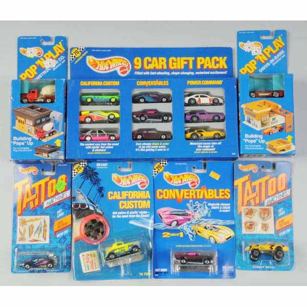 Lot of Assorted Mattel Hot Wheels Vehicles.: Includes nine car gift pack, two Pop and Play Construction Building sets, six California Customs, four Tattoo Machines, and three convertibles. Mint on cards, some with minor creasing. Not all picture