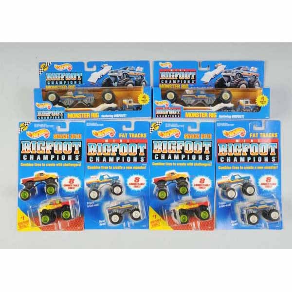 Lot of 12: Mattel Hot Wheels Big Foot Vehicles.: Includes two Monster Rigs in original boxes, three Snake Bites, four Fat Tracks, and three Tower Tires. Mint in boxes or mint on cards, some with wear. Not all pictured.