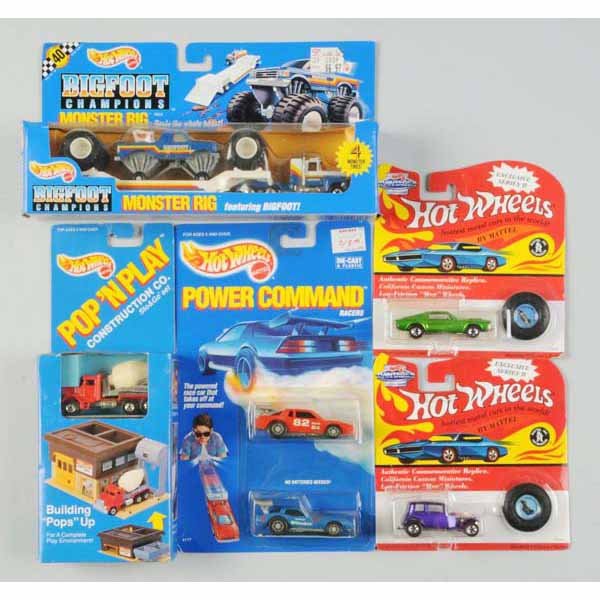 Lot of 16: Mattel Hot Wheels Assorted Vehicles.: Includes Pop 'N Play Construction Set in original box, Big Foot Monster Rig in original box, five 25th Anniversary Red Lines, two three-car Color Racer sets, two two-car Power Commands, three converti