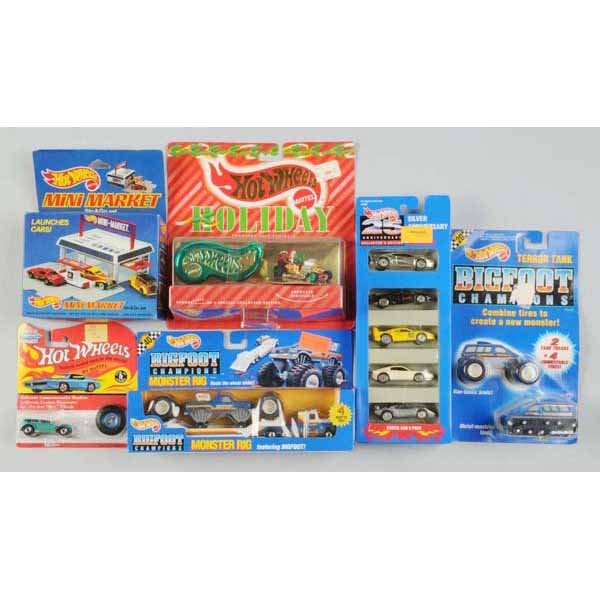 Lot of 17: Miscellaneous Mattel Hot Wheels Cars.: Includes Holiday Santa Claus car, Big Foot Terror Tank, Big Foot Monster Rig, two 25th Anniversary five-car packs, five 25th Anniversary Red Lines, three California Customs, two convertibles, and one
